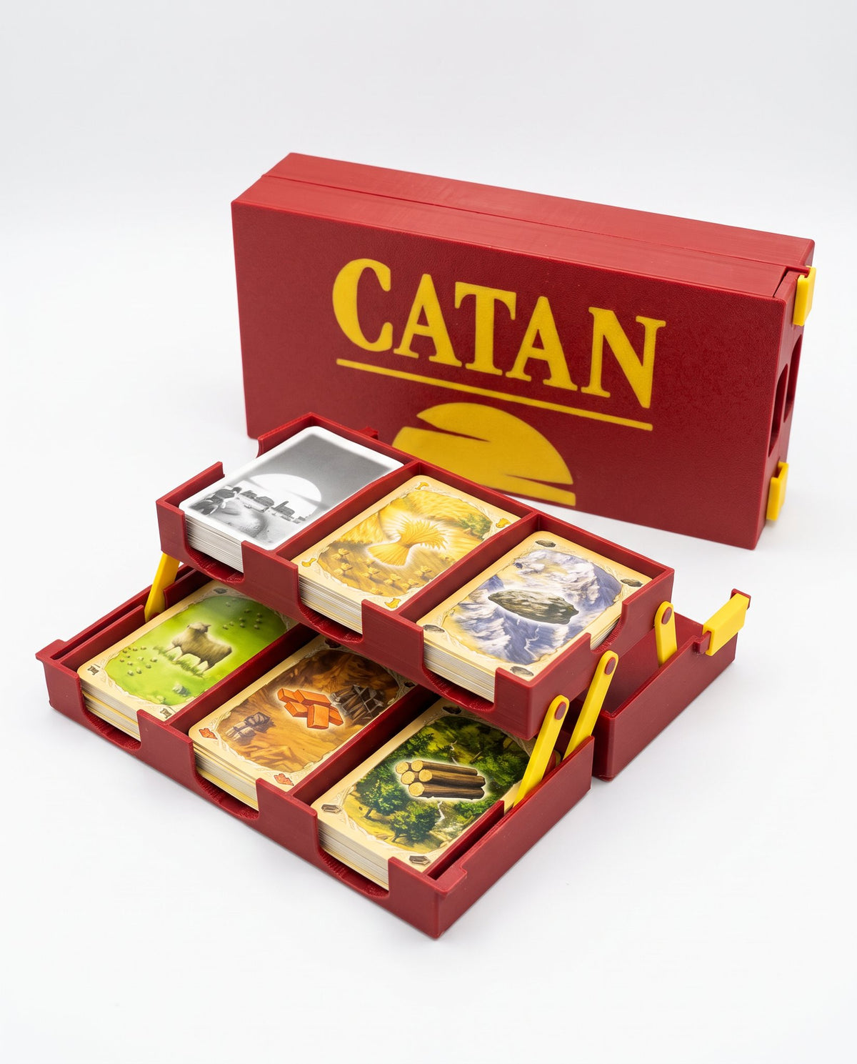 Organizador de Catan desplegado con cartas en sus compartimentos