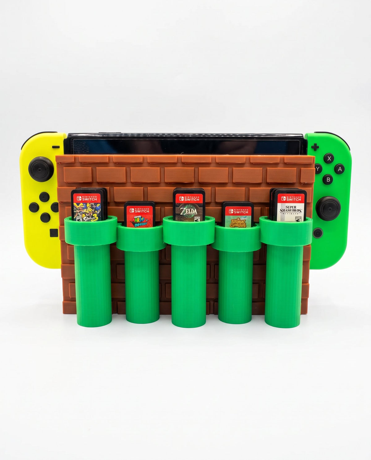 Soporte de Switch con ladrillos y tuberías verdes con cartuchos, vista frontal